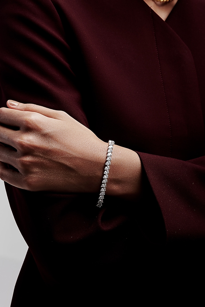 White Rhodium Finish Pear-Shaped Cubic Zirconia Crystal Tennis Bracelet In Sterling Silver by MISS JO at Pernia's Pop Up Shop