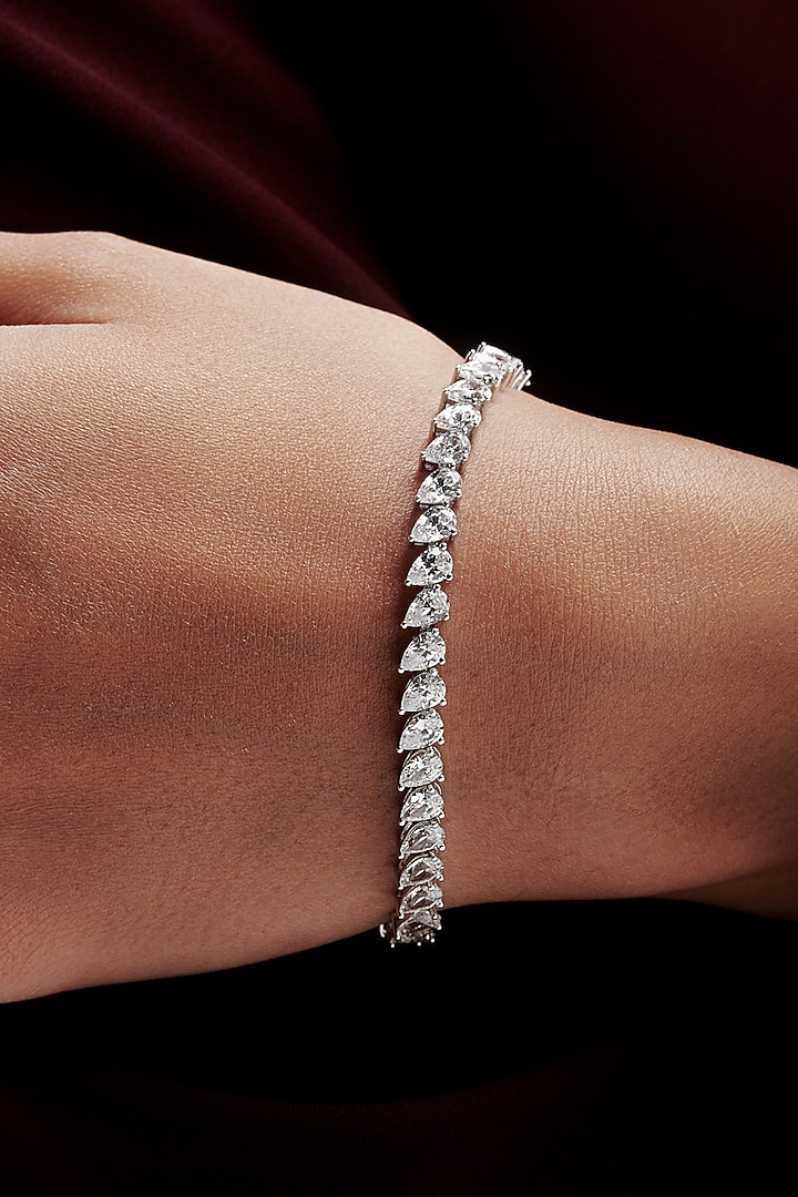 White Rhodium Finish Pear-Shaped Cubic Zirconia Crystal Tennis Bracelet In Sterling Silver by MISS JO at Pernia's Pop Up Shop