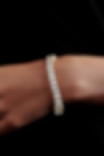 Gold Finish Oval-Shaped Cubic Zirconia Crystal Tennis Bracelet In Sterling Silver by MISS JO at Pernia's Pop Up Shop