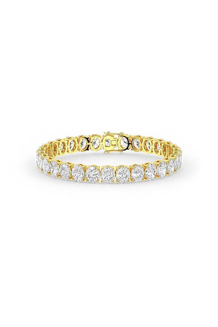 Gold Finish Oval-Shaped Cubic Zirconia Crystal Tennis Bracelet In Sterling Silver by MISS JO at Pernia's Pop Up Shop