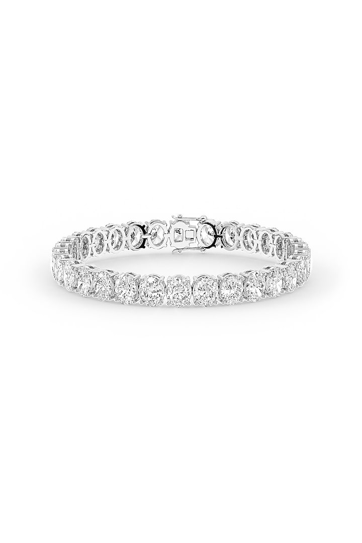 White Rhodium Finish Oval-Shaped Cubic Zirconia Crystal Tennis Bracelet In Sterling Silver by MISS JO at Pernia's Pop Up Shop
