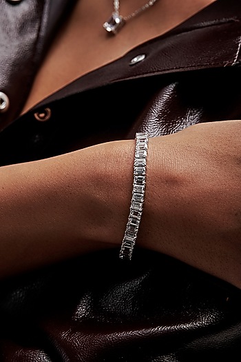 White Rhodium Finish Emerald-Cut Cubic Zirconia Crystal Tennis Bracelet In Sterling Silver by MISS JO at Pernia's Pop Up Shop