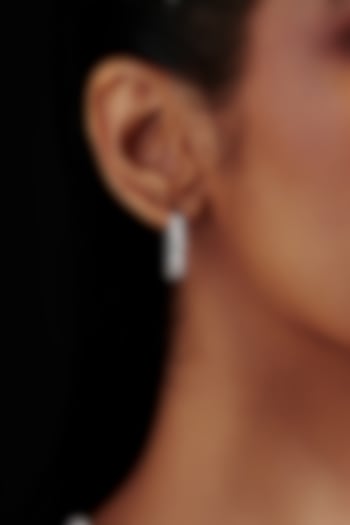 White Rhodium Finish Heart-Shaped Cubic Zirconia Crystal Hoop Earrings In Sterling Silver by MISS JO at Pernia's Pop Up Shop