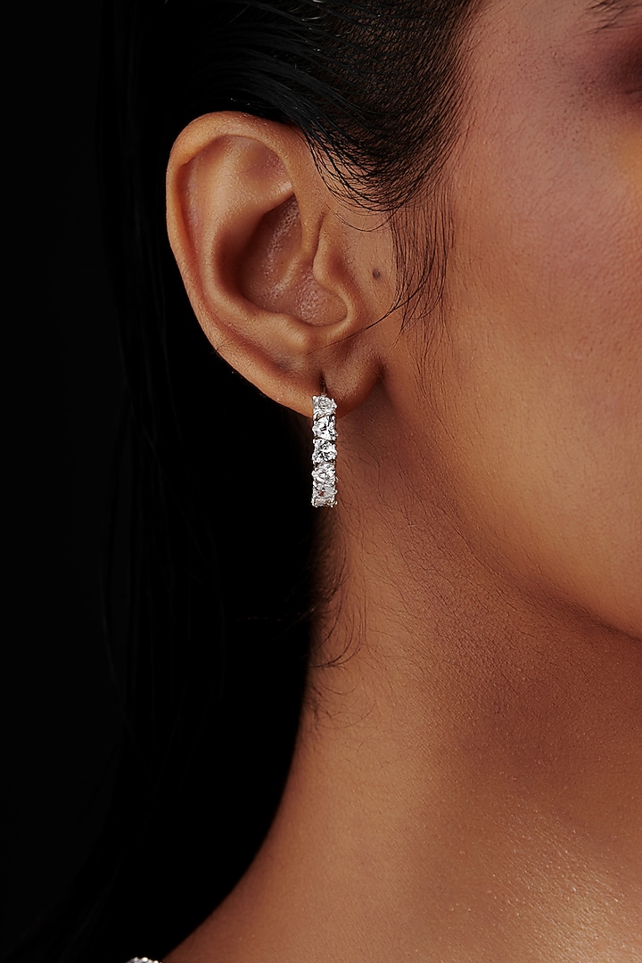 White Rhodium Finish Heart-Shaped Cubic Zirconia Crystal Hoop Earrings In Sterling Silver by MISS JO at Pernia's Pop Up Shop