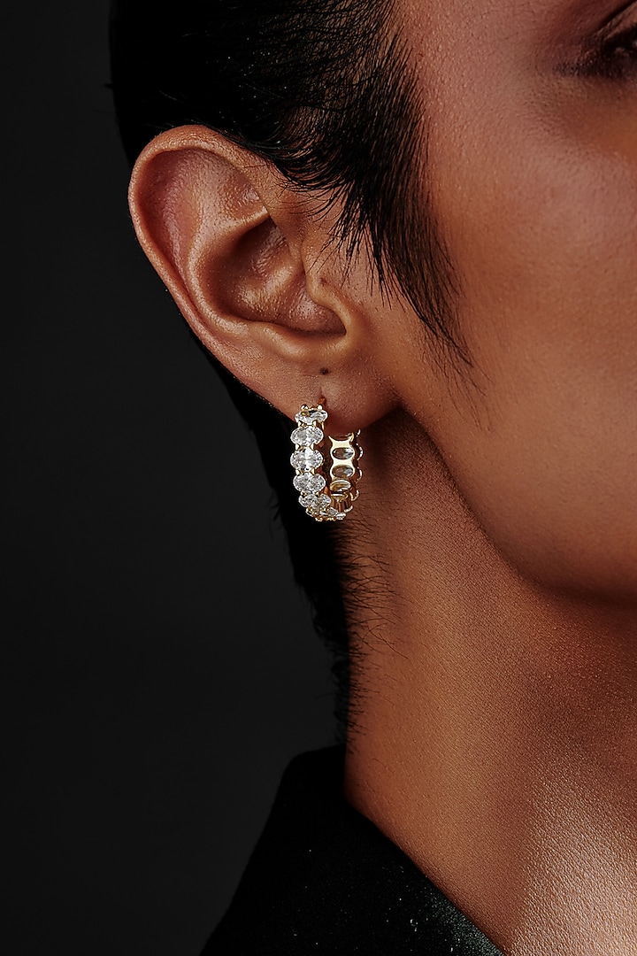 Gold Finish Oval-Shape Cubic Zirconia Crystal Hoop Earrings In Sterling Silver by MISS JO at Pernia's Pop Up Shop