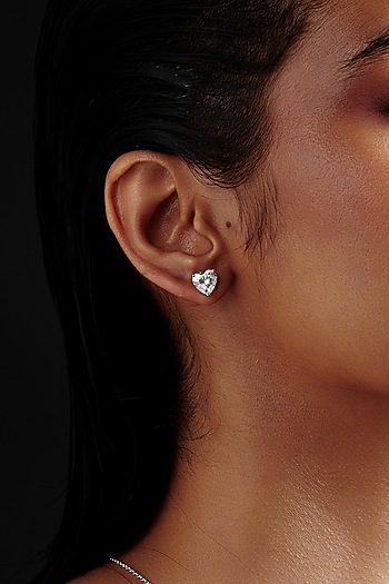 White Rhodium Finish Heart-Shaped Cubic Zirconia Crystal Stud Earrings In Sterling Silver by MISS JO at Pernia's Pop Up Shop
