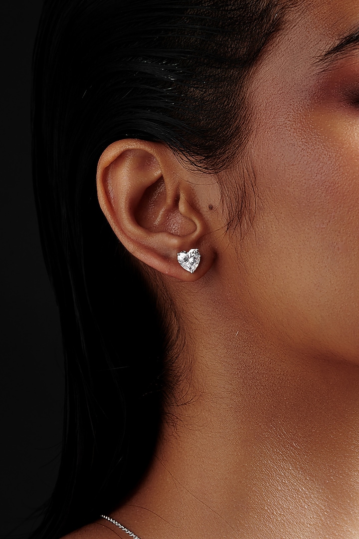White Rhodium Finish Heart-Shaped Cubic Zirconia Crystal Stud Earrings In Sterling Silver by MISS JO at Pernia's Pop Up Shop