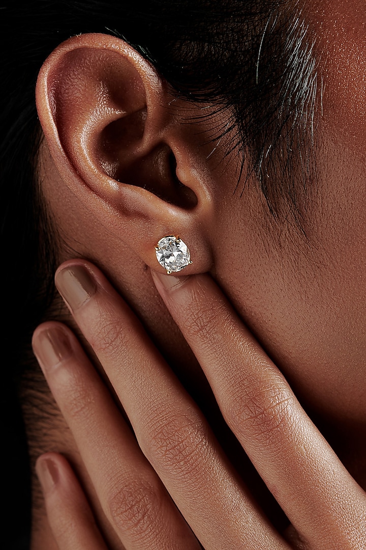 Gold Finish Oval-Shaped Cubic Zirconia Crystal Stud Earrings In Sterling Silver by MISS JO at Pernia's Pop Up Shop