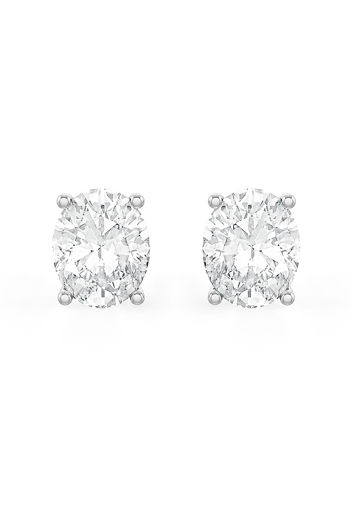 White Rhodium Finish Oval-Shaped Cubic Zirconia Crystal Stud Earrings In Sterling Silver by MISS JO at Pernia's Pop Up Shop