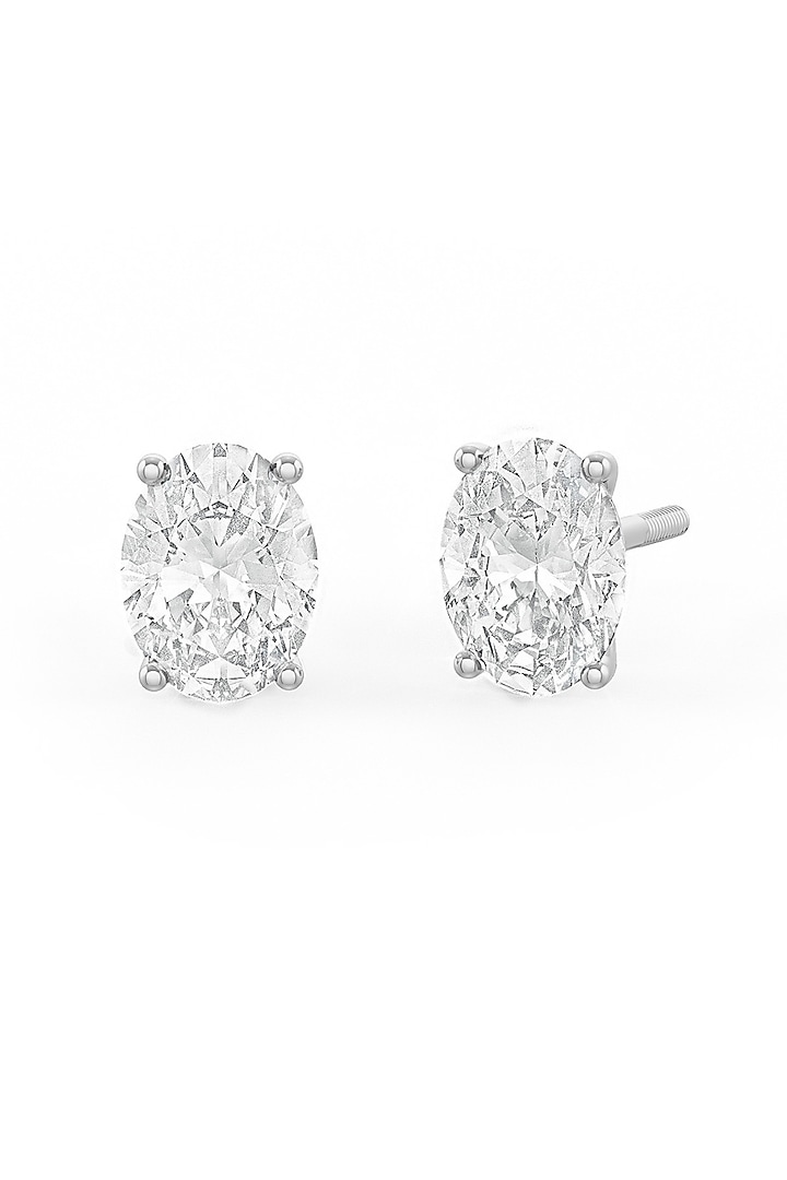 White Rhodium Finish Oval-Shaped Cubic Zirconia Crystal Stud Earrings In Sterling Silver by MISS JO at Pernia's Pop Up Shop