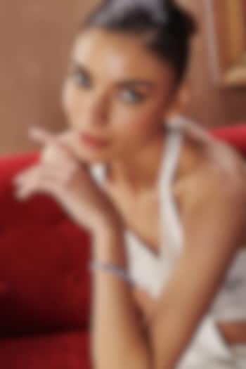 White Rhodium Finish Blue Sapphire Cubic Zirconia Crystal Tennis Bracelet In Sterling Silver by MISS JO at Pernia's Pop Up Shop