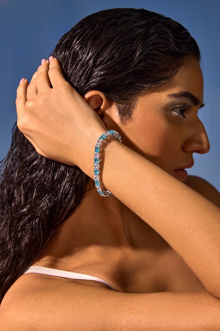White Rhodium Finish Aqua & White Cubic Zirconia Crystal Tennis Bracelet In Sterling Silver by MISS JO at Pernia's Pop Up Shop