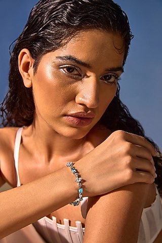White Rhodium Finish Blue Cubic Zirconia Crystal Tennis Bracelet In Sterling Silver by MISS JO