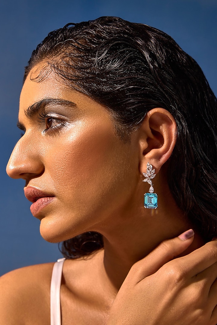 White Rhodium Finish Aqua Cubic Zirconia Crystal Dangler Earrings In Sterling Silver by MISS JO at Pernia's Pop Up Shop