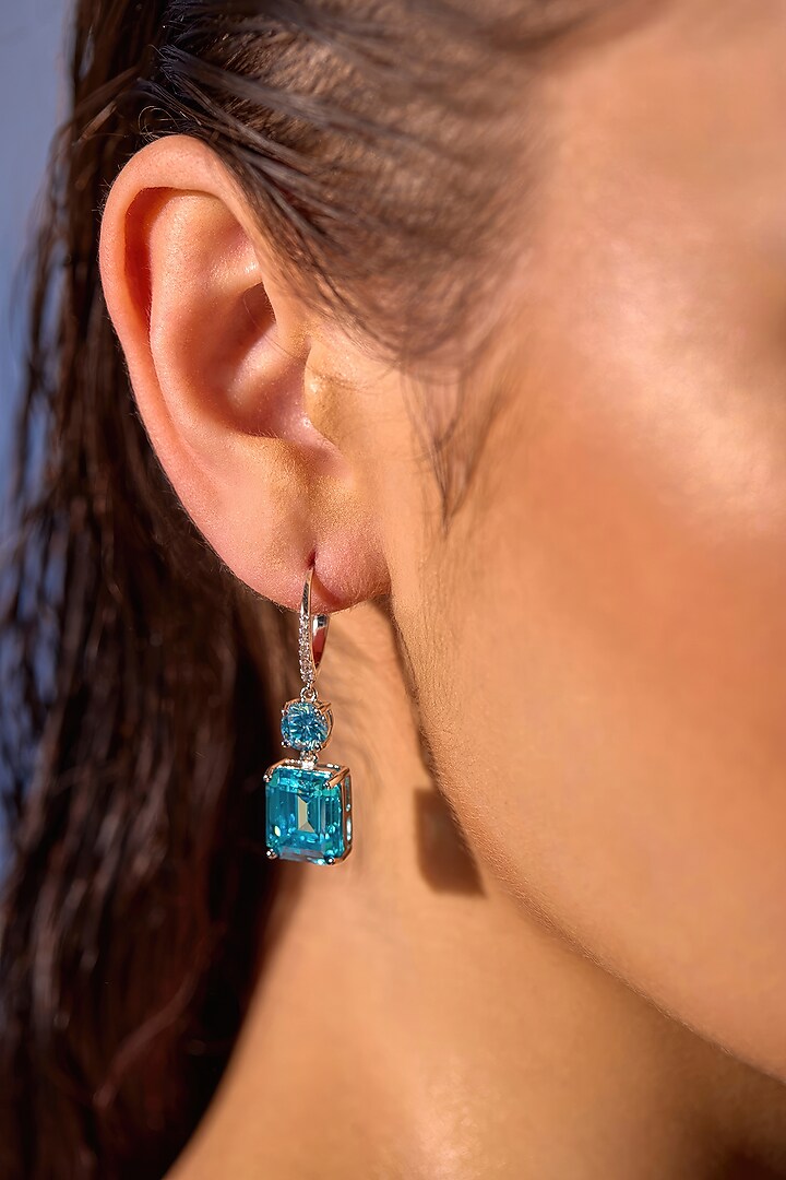 White Rhodium Finish Aqua Cubic Zirconia Crystal Dangler Earrings In Sterling Silver by MISS JO at Pernia's Pop Up Shop