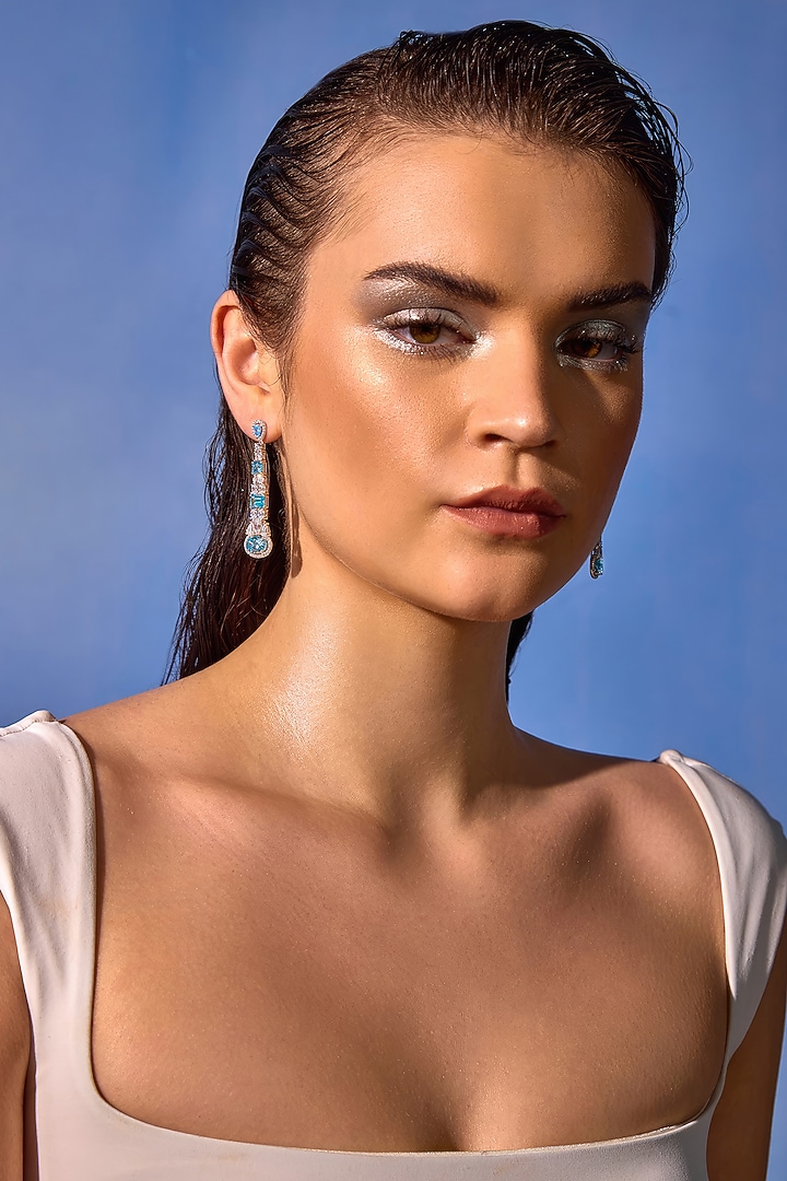 White Rhodium Finish Aqua Cubic Zirconia Crystal Dangler Earrings In Sterling Silver by MISS JO at Pernia's Pop Up Shop