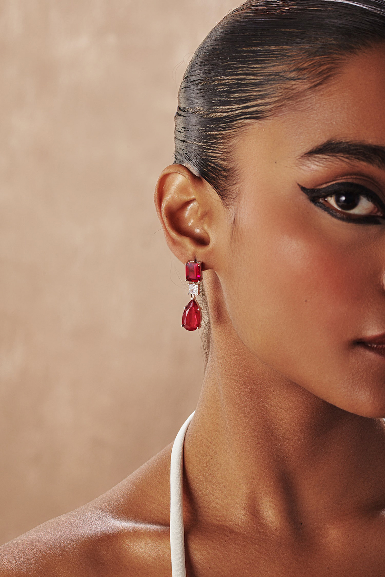 White Rhodium Finish Ruby Teardrop Cubic Zirconia Crystal Dangler Earrings In Sterling Silver by MISS JO at Pernia's Pop Up Shop