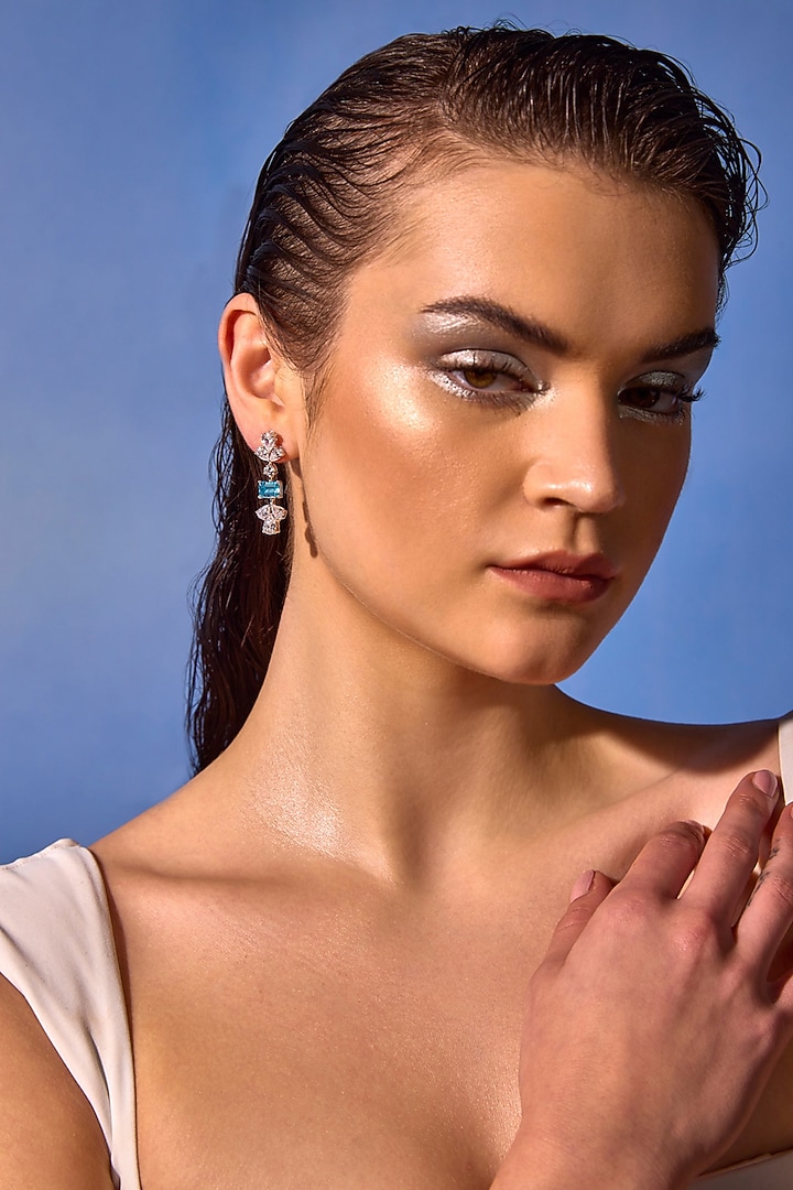 White Rhodium Finish Aqua Cubic Zirconia Crystal Dangler Earrings In Sterling Silver by MISS JO at Pernia's Pop Up Shop