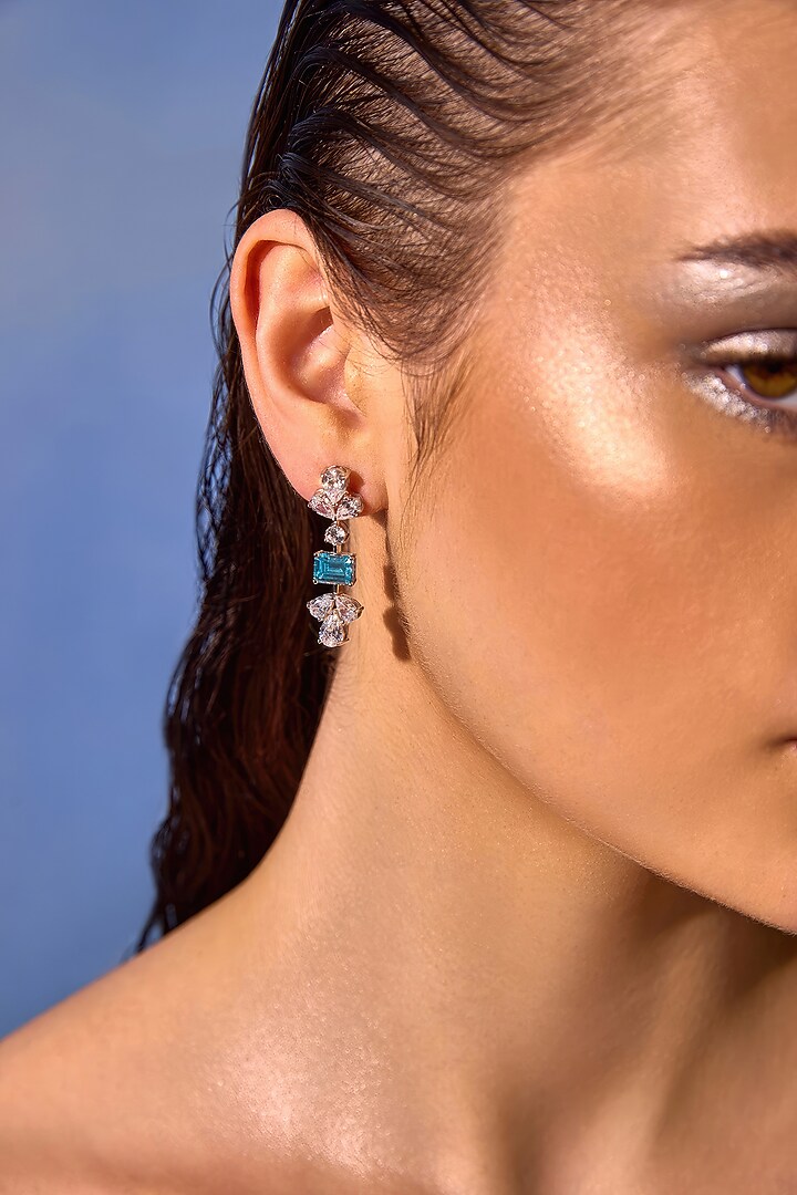 White Rhodium Finish Aqua Cubic Zirconia Crystal Dangler Earrings In Sterling Silver by MISS JO at Pernia's Pop Up Shop