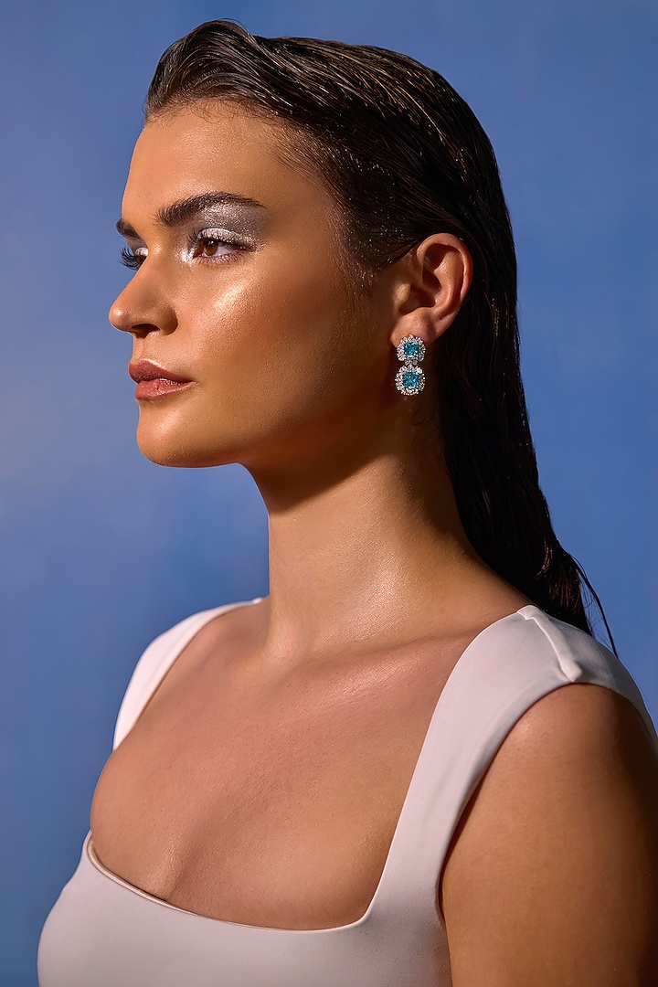 White Rhodium Finish Aqua Cubic Zirconia Crystal Dangler Earrings In Sterling Silver by MISS JO at Pernia's Pop Up Shop