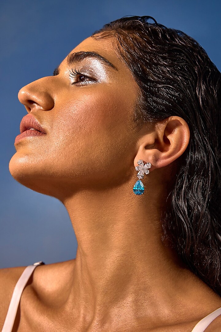 White Rhodium Finish Aqua Cubic Zirconia Crystal Floral Stud Earrings In Sterling Silver by MISS JO at Pernia's Pop Up Shop
