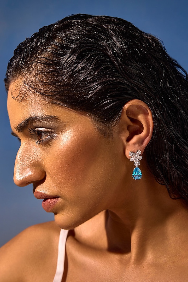 White Rhodium Finish Aqua Cubic Zirconia Crystal Floral Stud Earrings In Sterling Silver by MISS JO at Pernia's Pop Up Shop