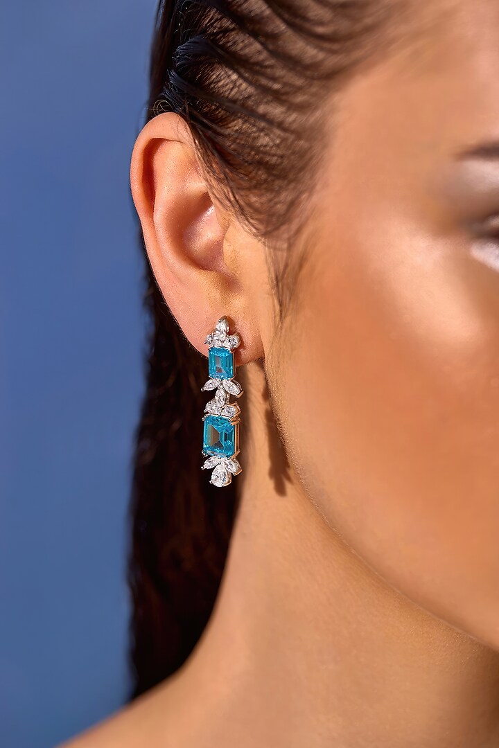 White Rhodium Finish Aqua Cubic Zirconia Crystal Floral Stud Earrings In Sterling Silver by MISS JO at Pernia's Pop Up Shop