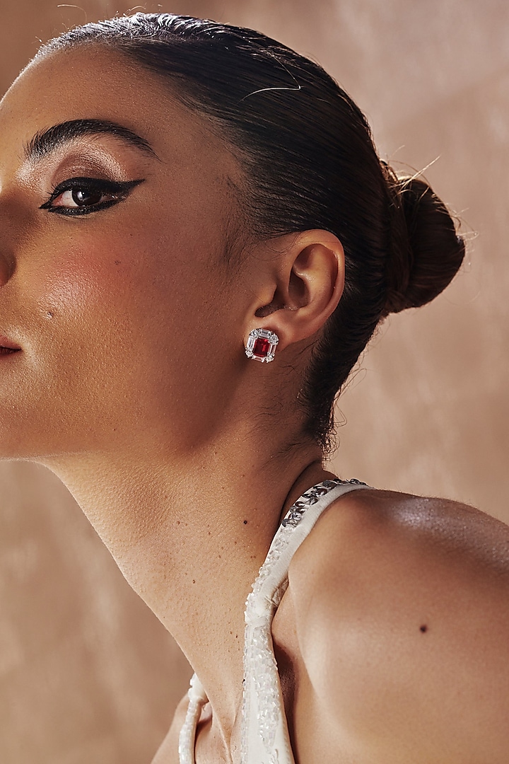 White Rhodium Finish Ruby Cubic Zirconia Crystal Floral Stud Earrings In Sterling Silver by MISS JO at Pernia's Pop Up Shop