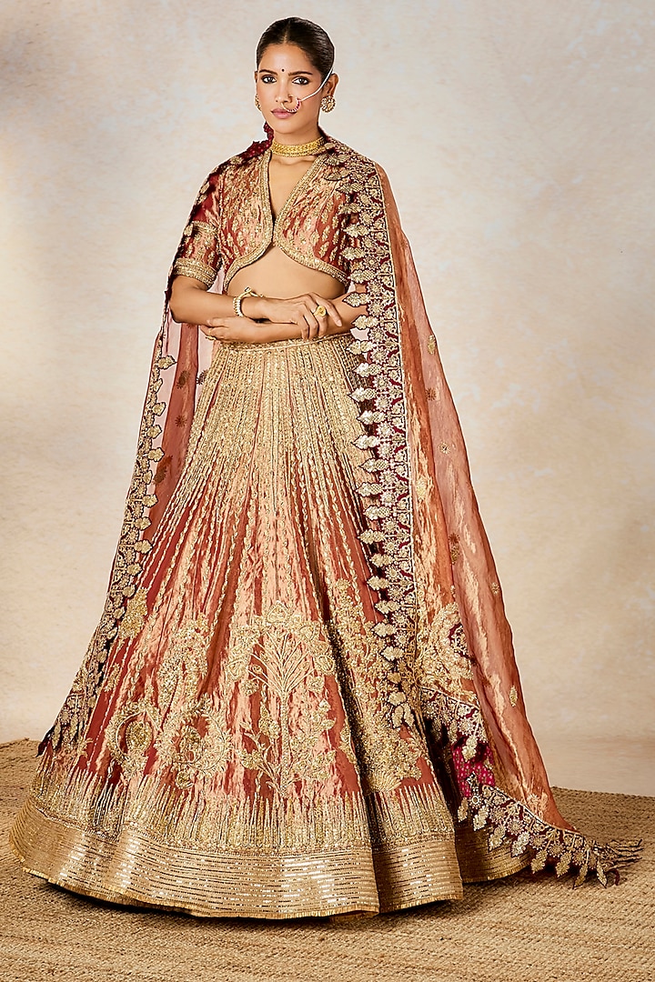 Rust Heavy Raw Silk & Tissue Motif Work Bridal Lehenga Set by Masaba at Pernia's Pop Up Shop
