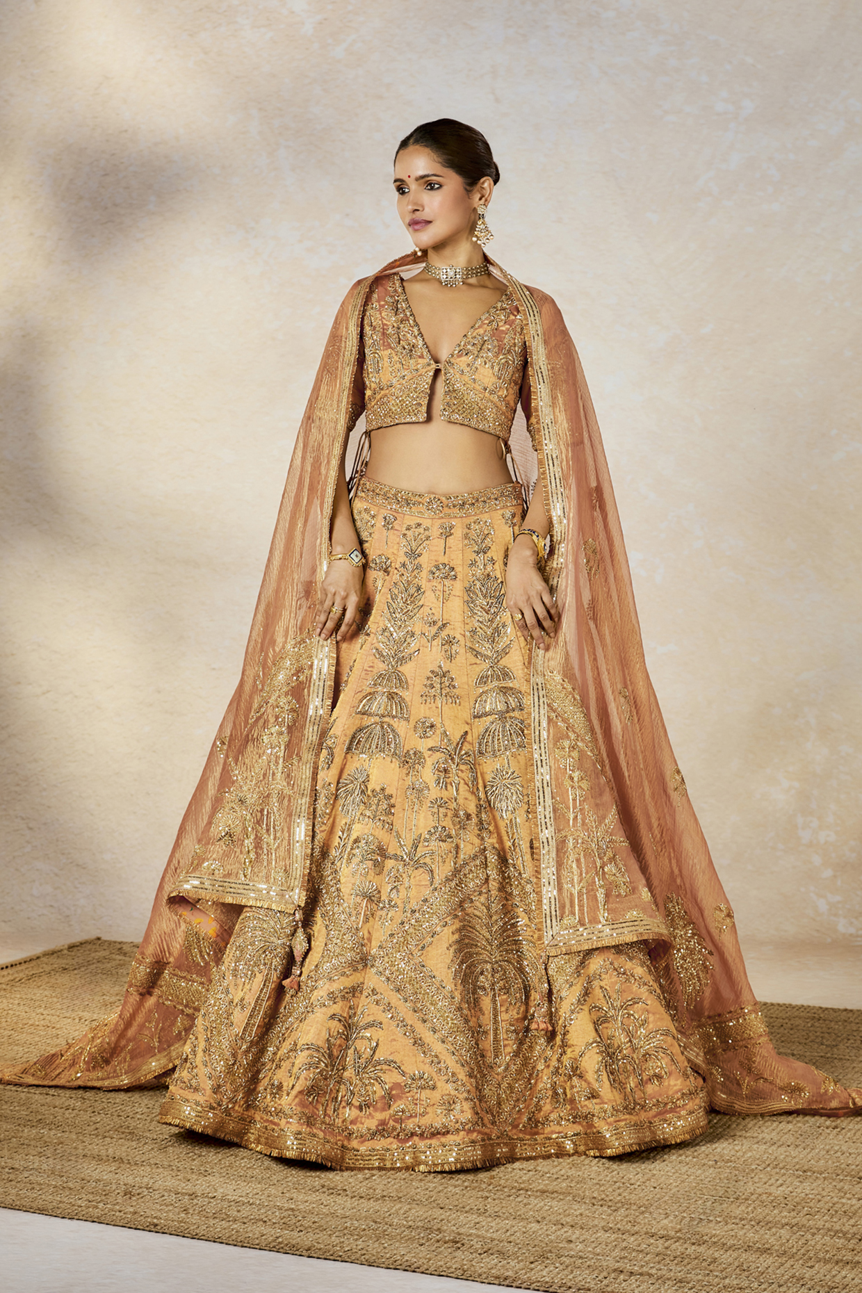 Peach Heavy Raw Silk & Tissue Motif Work Bridal Lehenga Set by Masaba at Pernia's Pop Up Shop