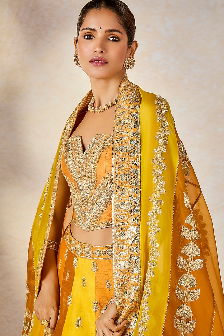 Ochre Yellow Heavy Raw Silk Motif Work Bridal Lehenga Set by Masaba at Pernia's Pop Up Shop