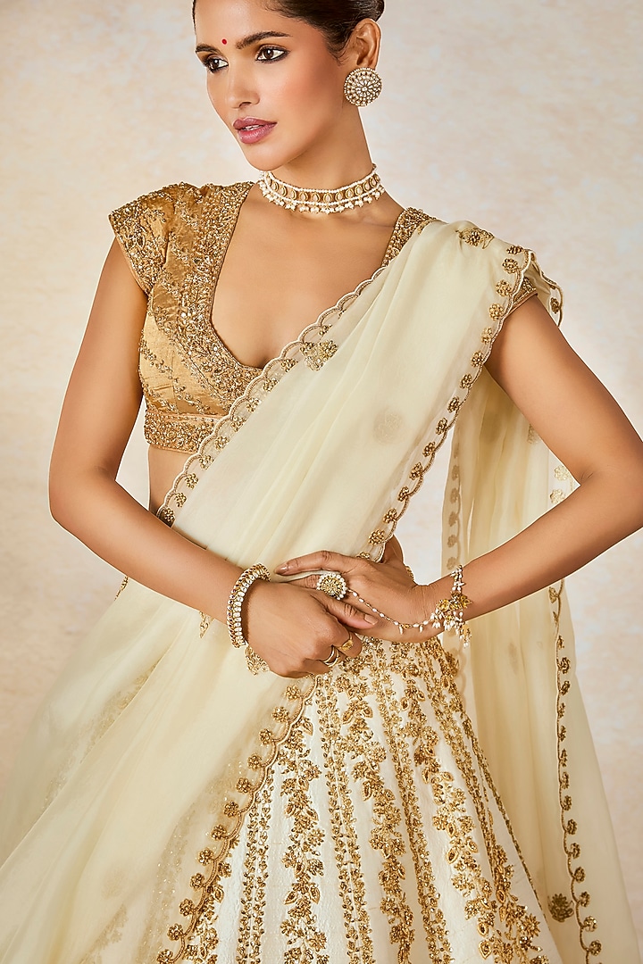 Ivory Heavy Raw Silk & Tissue Motif Work Bridal Lehenga Set by Masaba at Pernia's Pop Up Shop