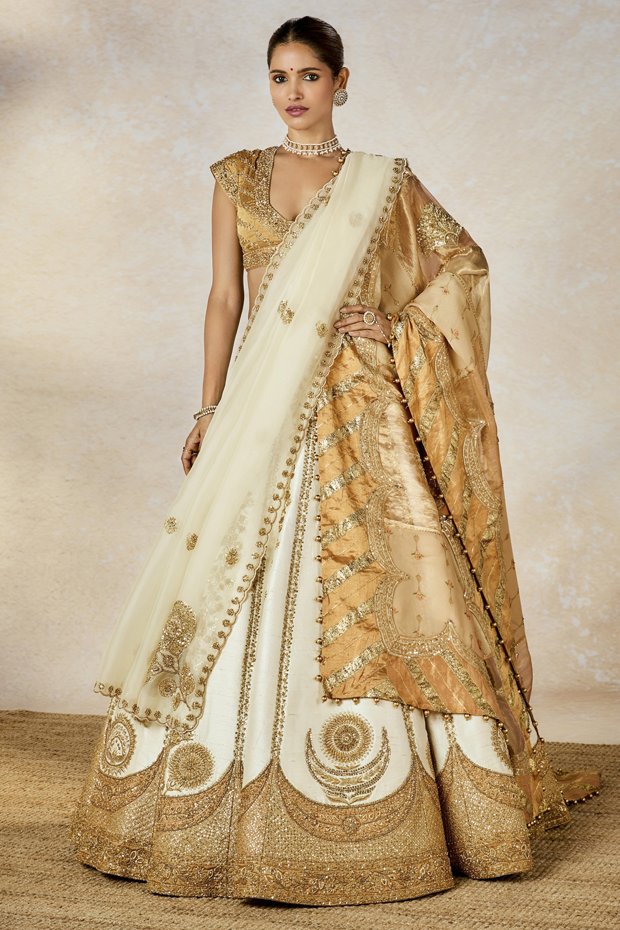 Ivory Heavy Raw Silk & Tissue Motif Work Bridal Lehenga Set by Masaba at Pernia's Pop Up Shop