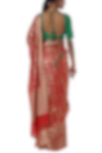 Red printed banarasi saree with green blouse piece by Masaba