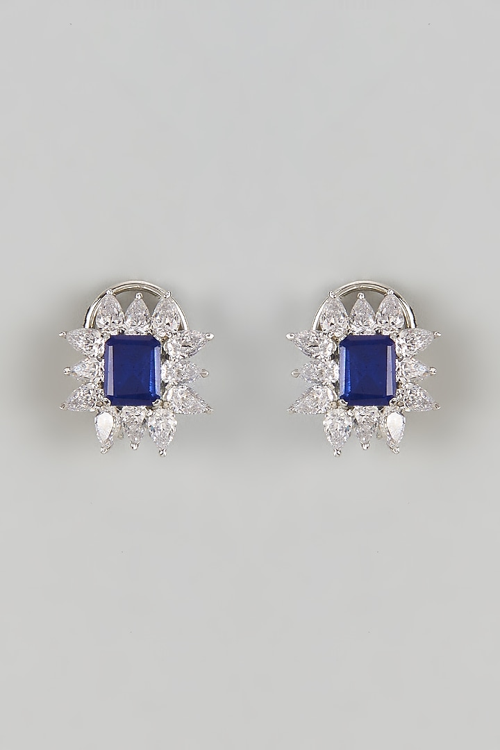 White Finish Halo Diamond & Blue Sapphire Stone Stud Earrings In Sterling Silver by Mon Tresor at Pernia's Pop Up Shop