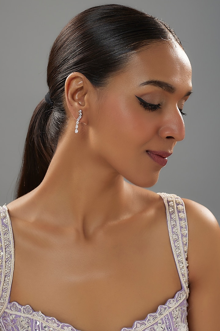 White Finish Zircon Dangler Earrings In Sterling Silver by Mon Tresor