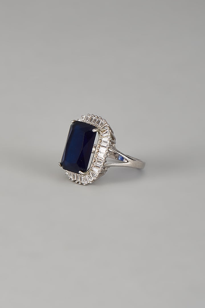White Finish Halo Diamond & Blue Sapphire Stone Ring In Sterling Silver by Mon Tresor at Pernia's Pop Up Shop