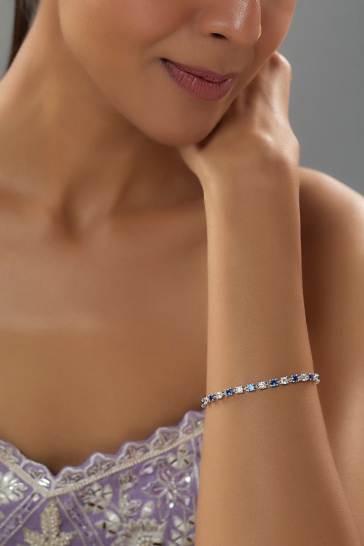 White Finish Diamond & Blue Sapphire Stone Bracelet In Sterling Silver by Mon Tresor at Pernia's Pop Up Shop