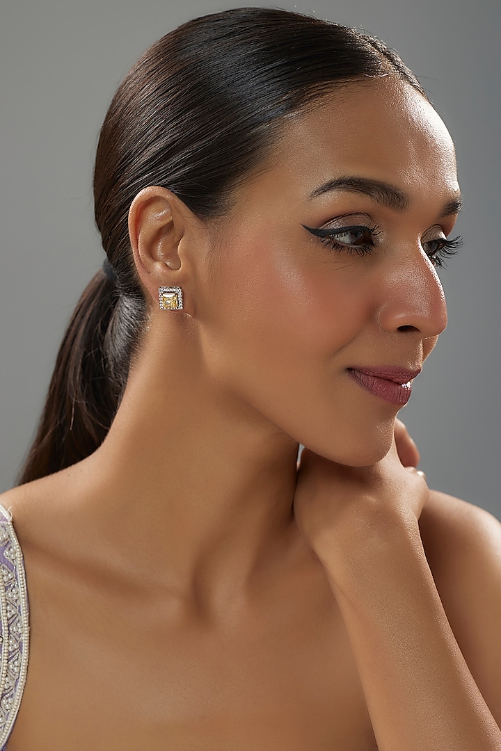 White Finish Halo Diamond & Yellow Sapphire Stone Stud Earrings In Sterling Silver by Mon Tresor at Pernia's Pop Up Shop