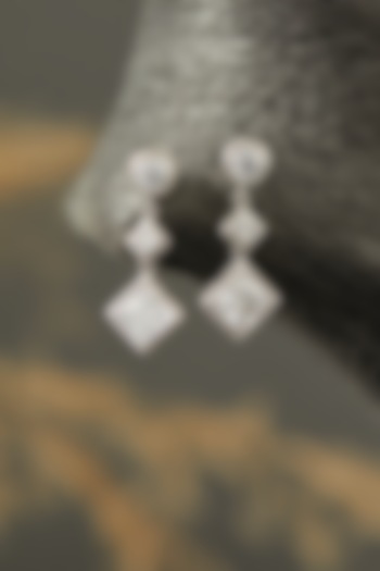 White Finish Zircon Dangler Earrings In Sterling Silver by Mon Tresor