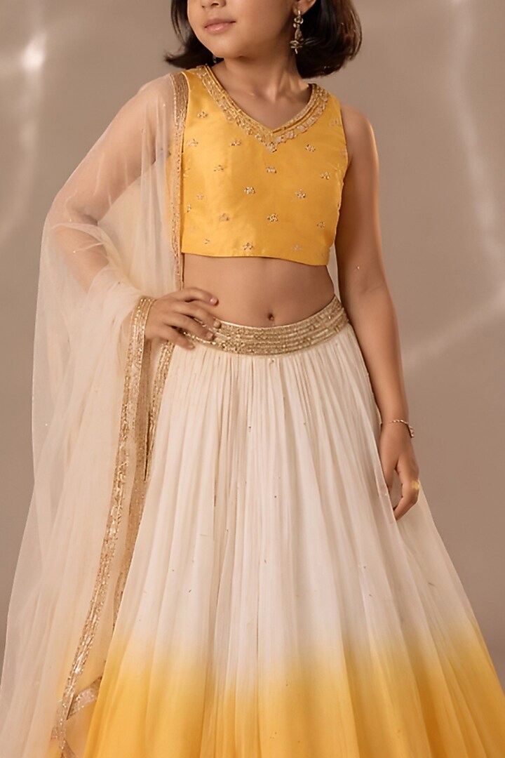 Yellow & Ivory Shaded Chiffon Sequins Chitta Embroidered Lehenga Set For Girls by DISHA MUCHHALA KIDS at Pernia's Pop Up Shop