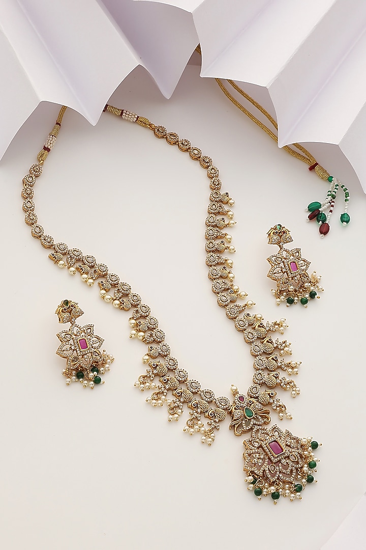 Gold Finish Handcrafted Red & Green Stone Temple Long Necklace Set by MUDRA LUXE at Pernia's Pop Up Shop