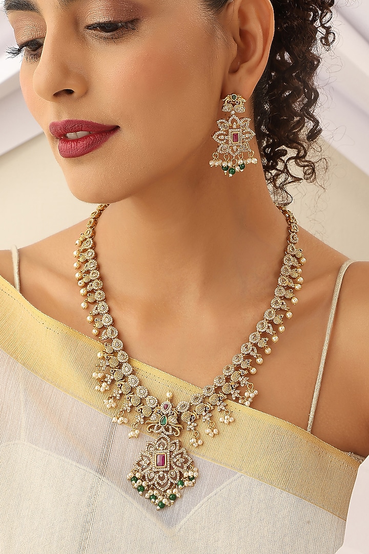 Gold Finish Handcrafted Red & Green Stone Temple Long Necklace Set by MUDRA LUXE at Pernia's Pop Up Shop