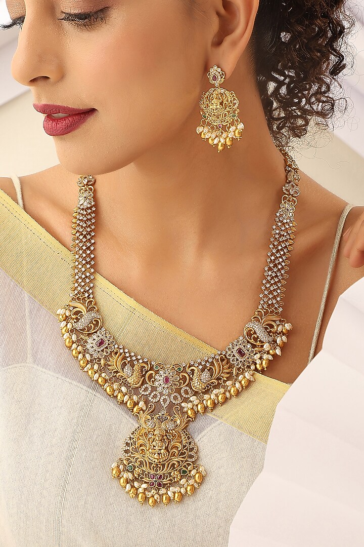 Gold Finish Handcrafted Red & Green Stone Temple Long Necklace Set by MUDRA LUXE at Pernia's Pop Up Shop