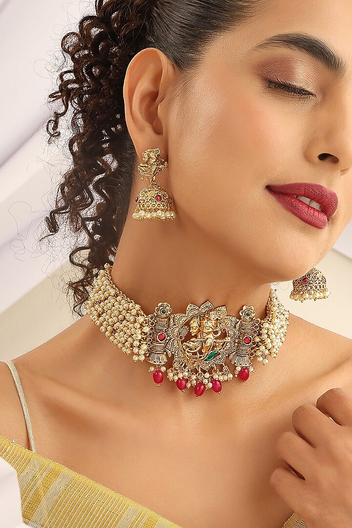Gold Finish Handcrafted Red & Green Stone Temple Choker Necklace Set by MUDRA LUXE at Pernia's Pop Up Shop