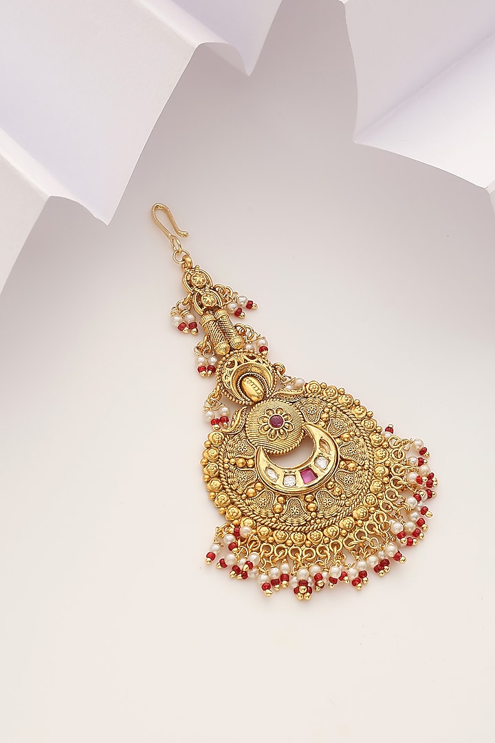 Gold Finish Red Stone Temple Maangtikka by MUDRA LUXE at Pernia's Pop Up Shop