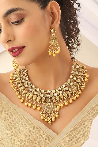 Gold Finish Stone Temple Necklace Set by MUDRA LUXE
