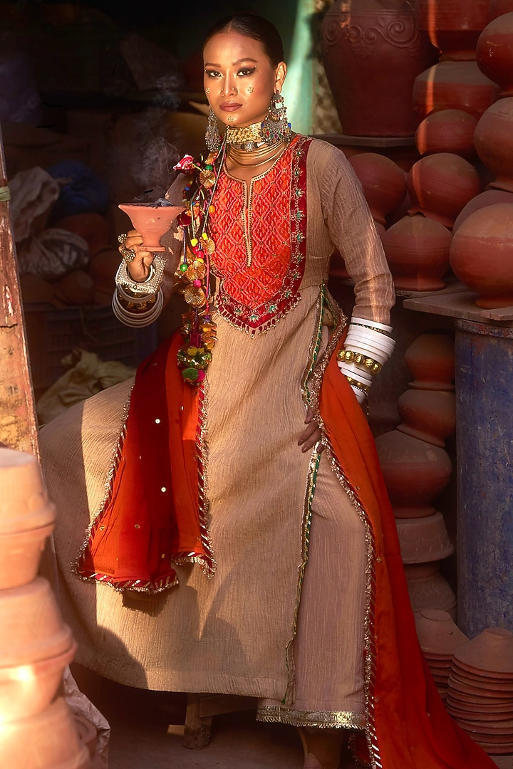 Beige & Orange Pochampally Raw Silk Ikat Fabric Handwork Kurta Set by Muskann Kapadiaa at Pernia's Pop Up Shop