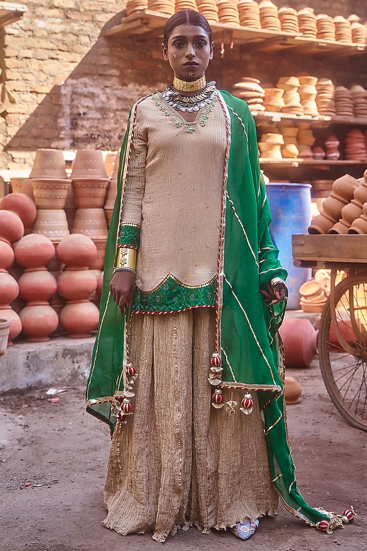 Green Pochampally Raw Silk Ikat Fabric Handwork Short Kurta Set by Muskann Kapadiaa at Pernia's Pop Up Shop