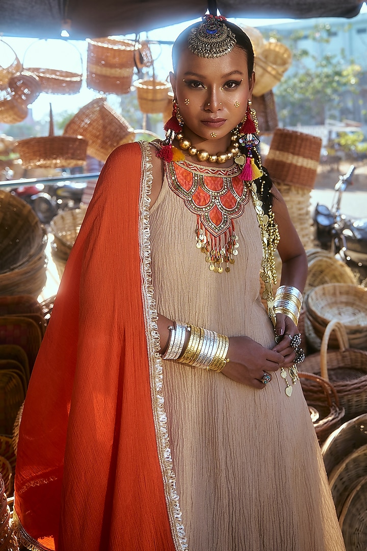 Beige & Orange Pochampally Raw Silk Ikat Fabric Handwork Kurta Set by Muskann Kapadiaa at Pernia's Pop Up Shop